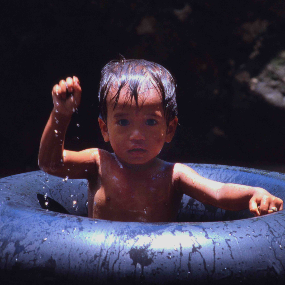 A Cambodian Child in Phnom Kulen Waterfalls